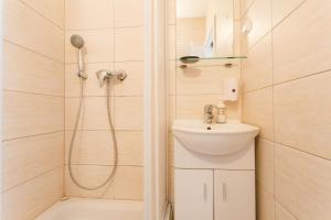 Kúpeľňa v ubytovaní Park Guest House By Blueapartments