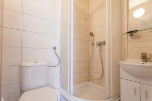 Kúpeľňa v ubytovaní Park Guest House By Blueapartments