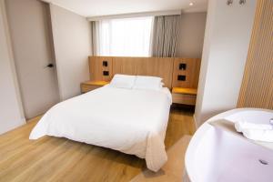 Nodo Hotel客房内的一张或多张床位