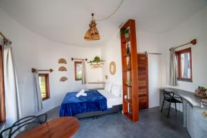 Cama ou camas em um quarto em VentoVinte Beach Club