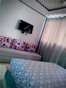 TV a/nebo společenská místnost v ubytování hôtel dar nokhba