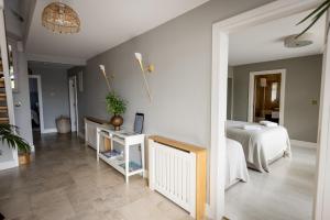 Letto o letti in una camera di Coastal View House