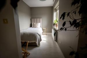 Letto o letti in una camera di Coastal View House