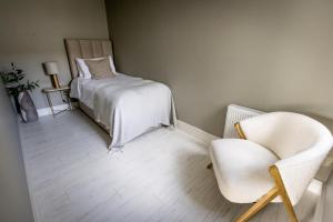 Letto o letti in una camera di Coastal View House