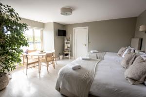 Letto o letti in una camera di Coastal View House