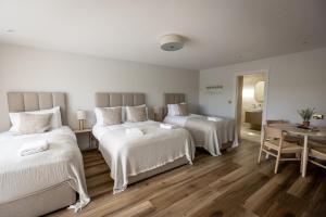 Letto o letti in una camera di Coastal View House