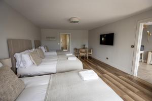 Letto o letti in una camera di Coastal View House