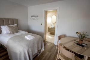Letto o letti in una camera di Coastal View House