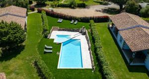 an overhead view of a swimming pool in a yard at Tenuta Pilastru Country Resort & Spa in Arzachena