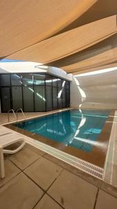 Πισίνα στο ή κοντά στο Wishes Luxury villa near to beach