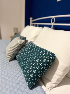 A bed or beds in a room at Haraki Blue Horizon