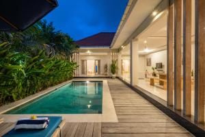 an indoor swimming pool in a villa at ☆ Villa Larissa ☆ Seminyak 2BR Pool Kuta Petitenget in Seminyak