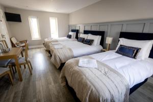 Letto o letti in una camera di Coastal View House
