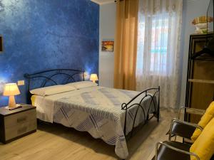 Posteľ alebo postele v izbe v ubytovaní casa RosAlina