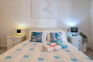 Postel nebo postele na pokoji v ubytování Casa mare & spa Alghero