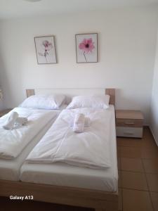Postel nebo postele na pokoji v ubytování HOTEL RAJSKY