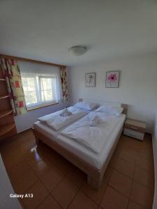 Postel nebo postele na pokoji v ubytování HOTEL RAJSKY