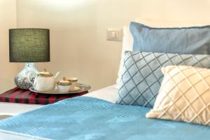 Postel nebo postele na pokoji v ubytování Casa mare & spa Alghero