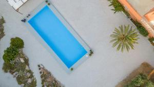 Πισίνα στο ή κοντά στο Little Eden Homes