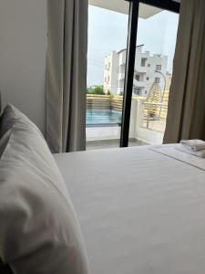 Cama ou camas em um quarto em Noa Boutique Hotel
