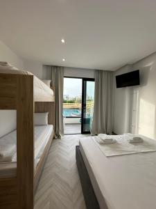Cama ou camas em um quarto em Noa Boutique Hotel