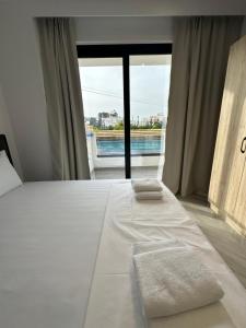 Cama ou camas em um quarto em Noa Boutique Hotel