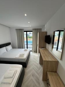 Cama ou camas em um quarto em Noa Boutique Hotel