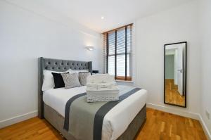 Katil atau katil-katil dalam bilik di Avari Apartments - Gray's Collection