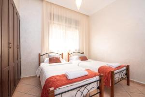 Katil atau katil-katil dalam bilik di 2 mins to Agadir Beach & Attractions