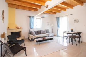 Χώρος καθιστικού στο Maison Aleste Lefkada