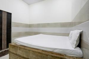 Postel nebo postele na pokoji v ubytování Hotel O YOUR RESIDENCY