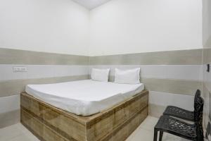 Postel nebo postele na pokoji v ubytování Hotel O YOUR RESIDENCY