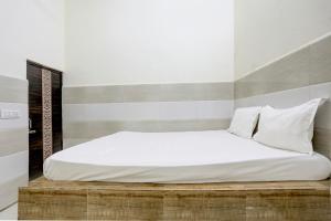Postel nebo postele na pokoji v ubytování Hotel O YOUR RESIDENCY
