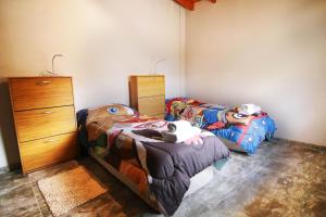 Postel nebo postele na pokoji v ubytování Aire Montañas