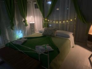 Postel nebo postele na pokoji v ubytování Villa Irma guest house