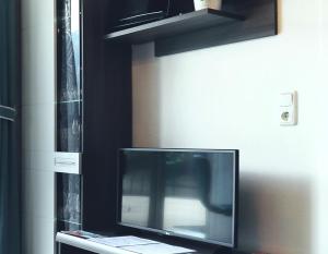 Telewizja i/lub zestaw kina domowego w obiekcie Fricks Appartement