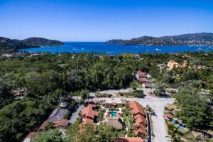 an aerial view of a resort with the ocean at Bungalow LUXURY cerca a la Playa Zihuatanejo Mexico in Ixtapa +3 photos