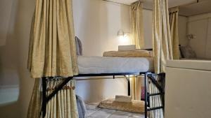 Katil dua tingkat atau katil-katil dua tingkat dalam bilik di Casa Samor La Candelaria
