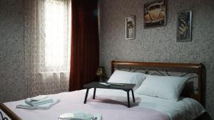 Postel nebo postele na pokoji v ubytování Eleven Guest House