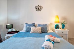Postel nebo postele na pokoji v ubytování Casa mare & spa Alghero
