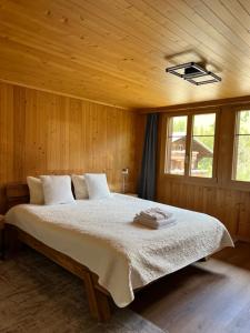 Postel nebo postele na pokoji v ubytování Chalet Diablerets