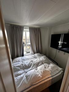 Posteľ alebo postele v izbe v ubytovaní KB Basement Apartment