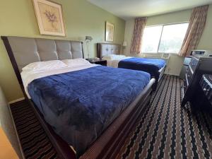 Krevet ili kreveti u jedinici u okviru objekta River Walk Inn