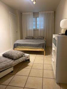 Кровать или кровати в номере The City Centre Apartment Turku