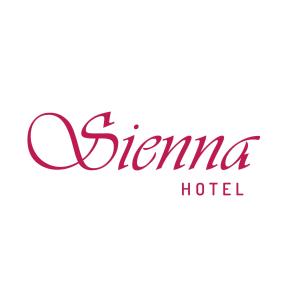 un letrero para un hotel con las palabras Disneyland Hotel en Hotel Sienna en Mendoza