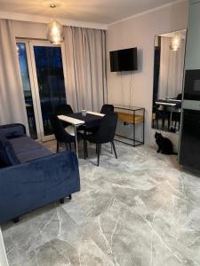 TV a/nebo společenská místnost v ubytování Apartament w centrum Hel