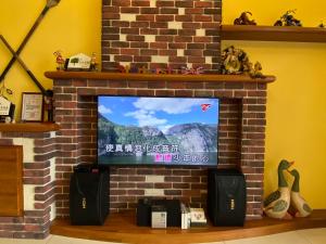 TV a/nebo společenská místnost v ubytování Starburst Bed & Breakfast宜蘭羅東星賞民宿