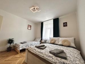 Ένα ή περισσότερα κρεβάτια σε δωμάτιο στο NewAPT next to Wenceslas Square