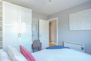 A bed or beds in a room at The Foundry