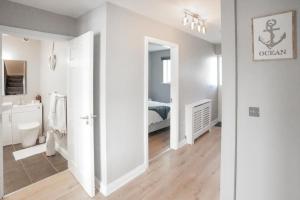 A bed or beds in a room at The Foundry